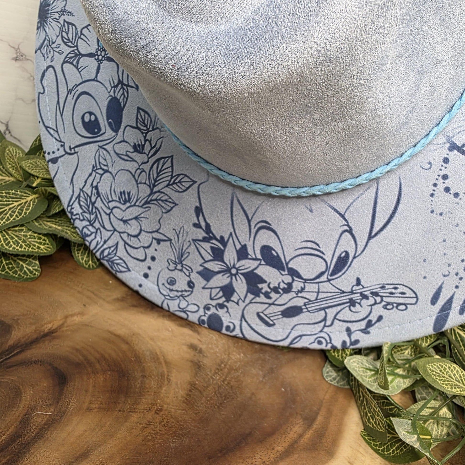 Stitch inspired tropical engraved wide brim hat flat lay