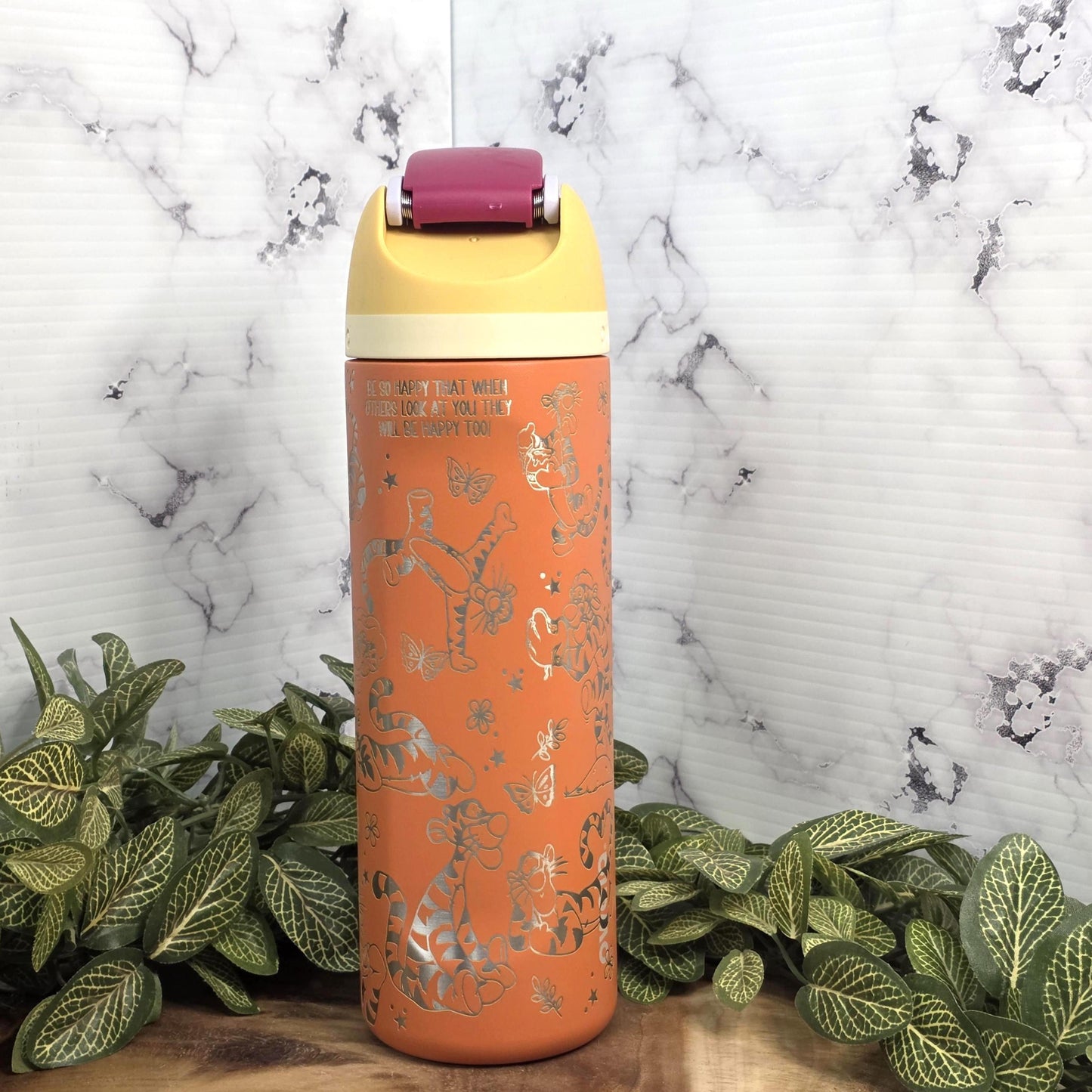Laser engraved Owala tumbler featuring Tigger inspired design on insulated stainless steel bottle