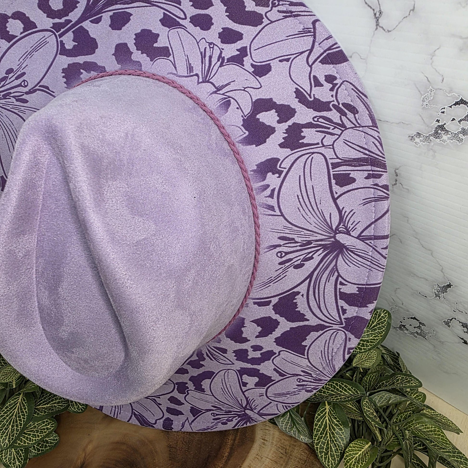 Boutique fashion statement hat with floral leopard overlay