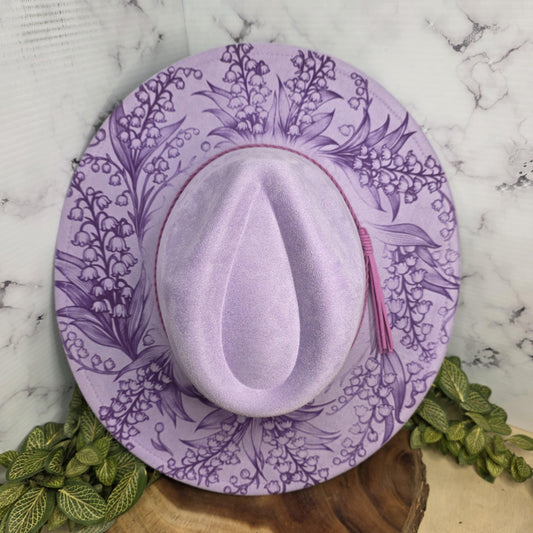 lavender vegan suede wide brim hat laser engraved lily of the valley botanical