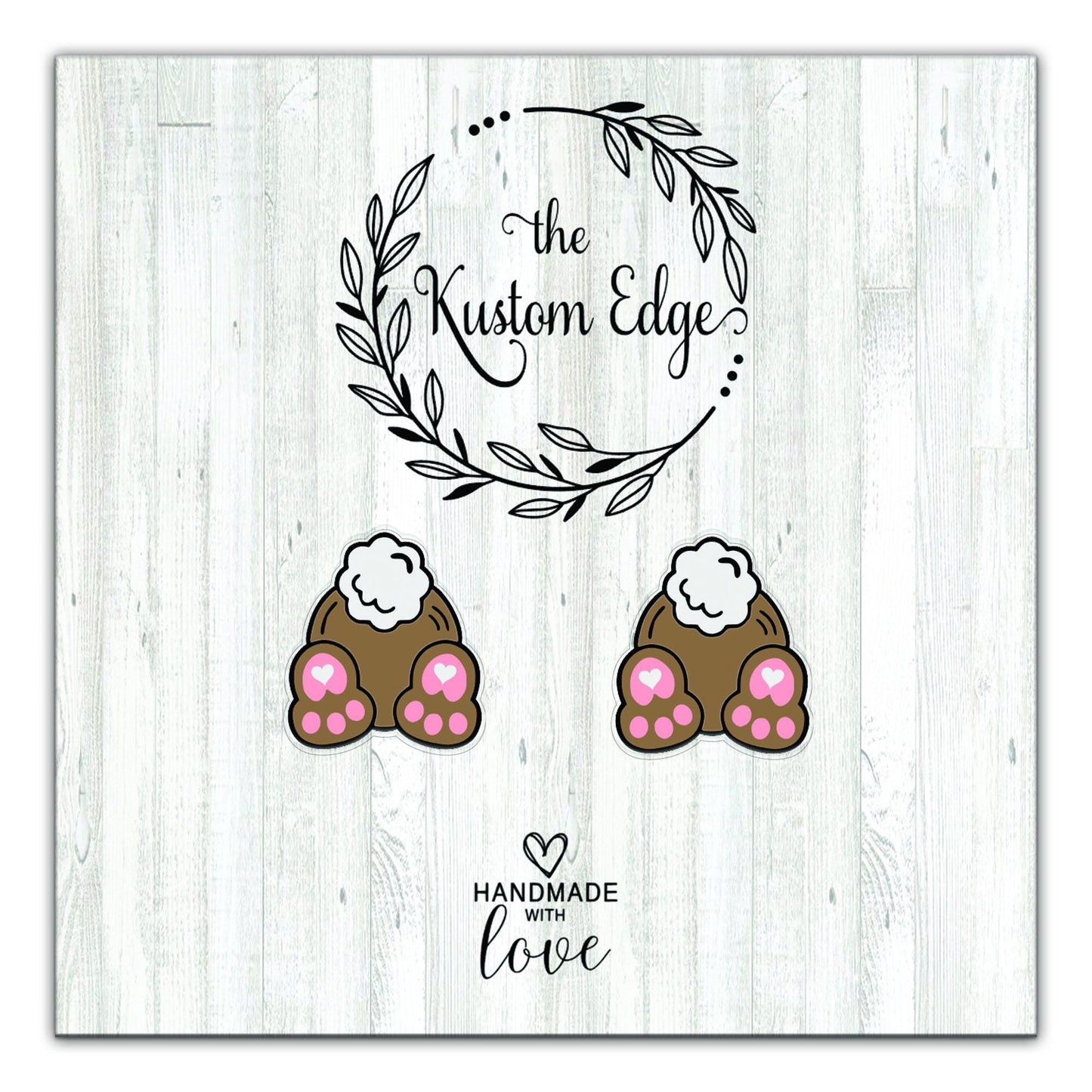 Bunny paw stud earrings with pink hearts on The Kustom Edge earring card